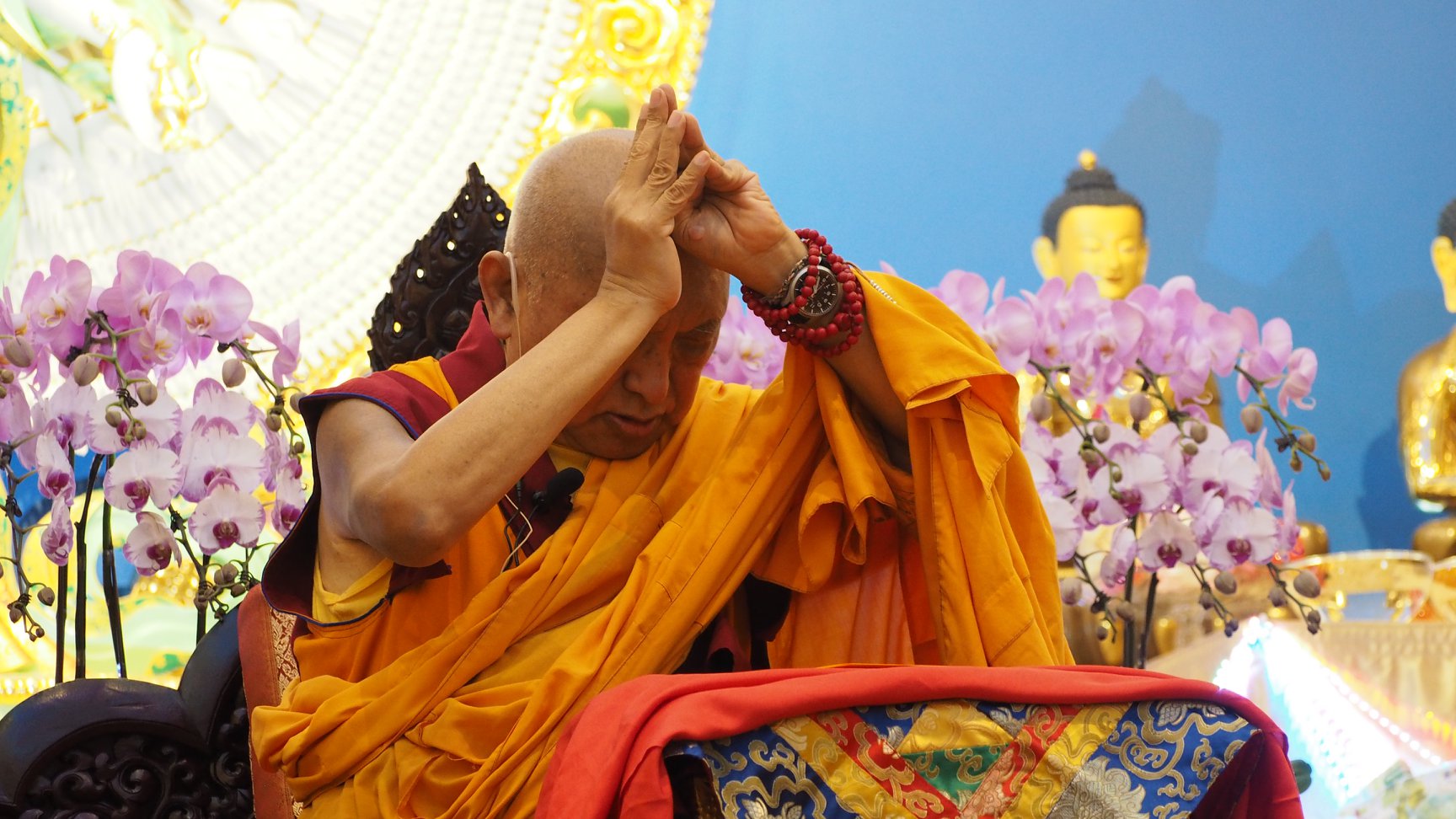 Lama Zopa Rinpoche making requests to the lineage lamas with hands in the prostration mudra during prayers at Amitabha Buddhist Center, Singapore, 2018. (Photo Ven Tenzin Tsultrim)