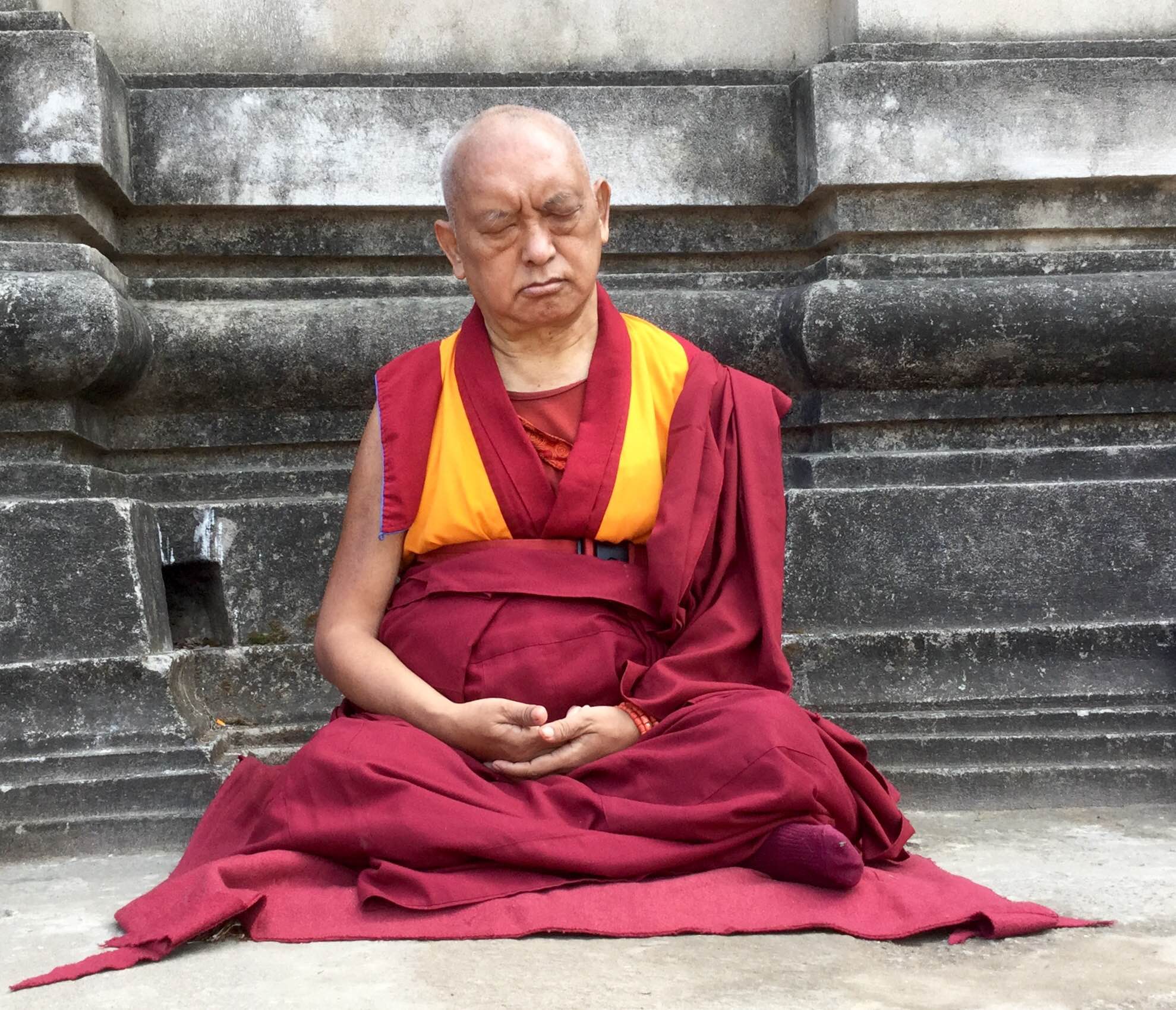  Lama Zopa Rinpoche meditating at the Mahabodhi Stupa in Bodhgaya, 2015. (Photo Ven Sarah Thresher)