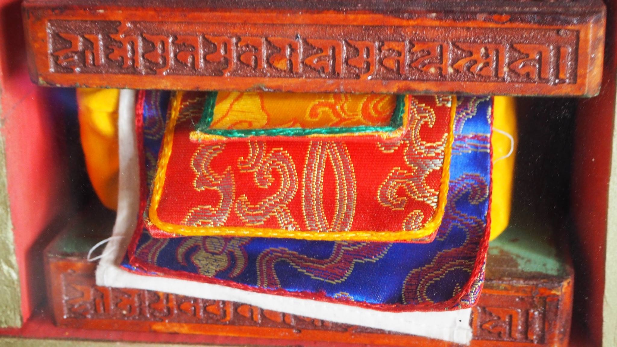 Tibetan text, wrapped and protected. (Ven Tenzin Tsultrim)