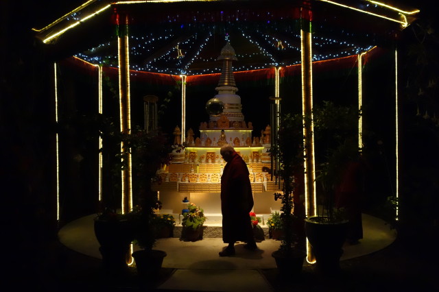 Lama Zopa Rinpoche circumambulates the stupa at Khachoe Dechen Ling, California, late at night. Rinpoche’s ability to go without sleep is legendary. (Photo Ven Roger Kunsang)