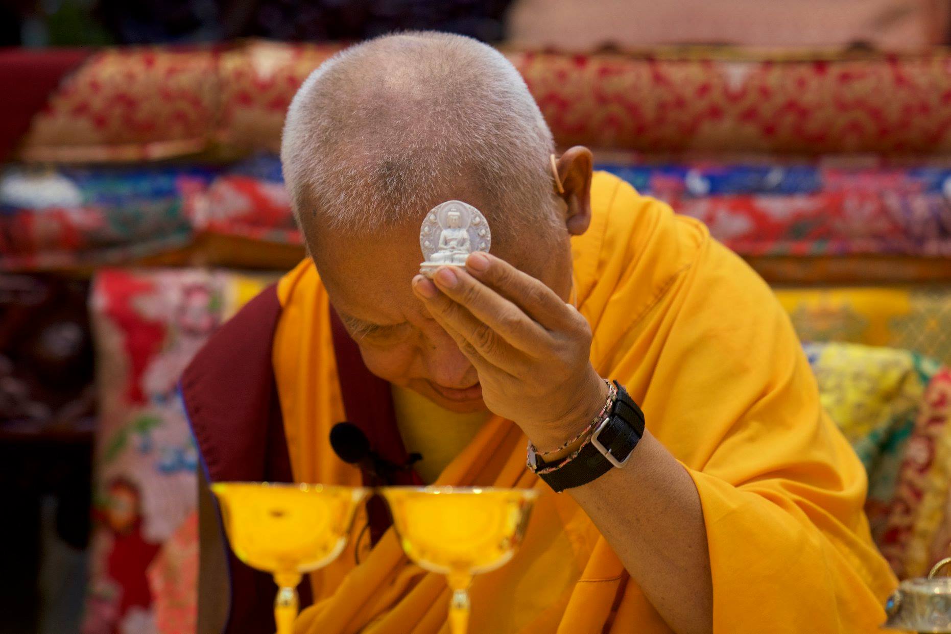 Lama Zopa Rinpoche bestowing Amitabha Pure Land blessing at Amitabha Buddhist Centre, Singapore, October 2018. (Photo Bill Kane)