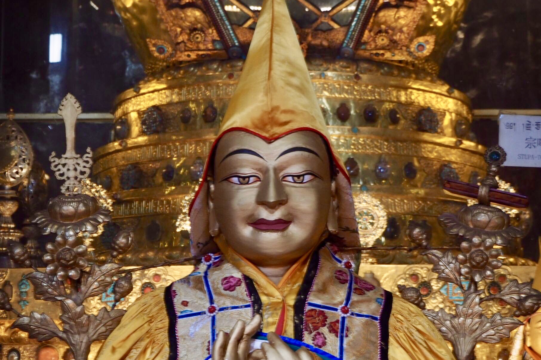 Statue of Lama Tsongkhapa at Ganden Monastery, Tibet, in front of the stupa containing his relics. (Photo Ven Tenzin Tsultrim)