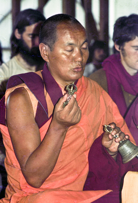 Lama Yeshe doing puja at Chenrezig Institute, 1975. (Photographer unknown)