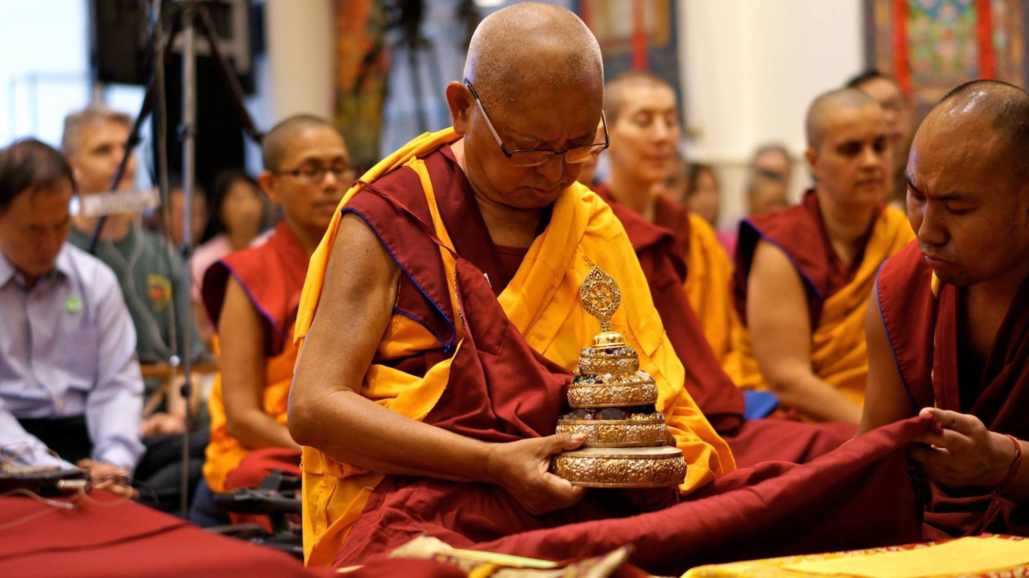 Lama Zopa Rinpoche offering a mandala, ABC, Singapore, 2016. (Photo Bill Kane)